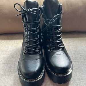 Like new Black platform combat style boots. Size 7